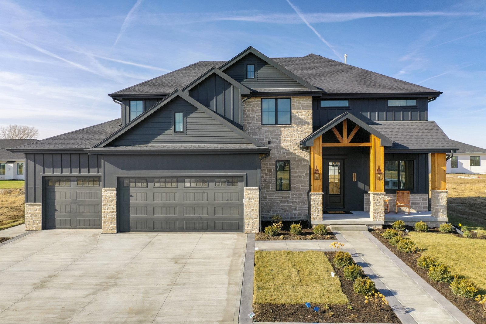 curb view of The Heidi, a custom built home by Omaha's Citadel Signature Homes