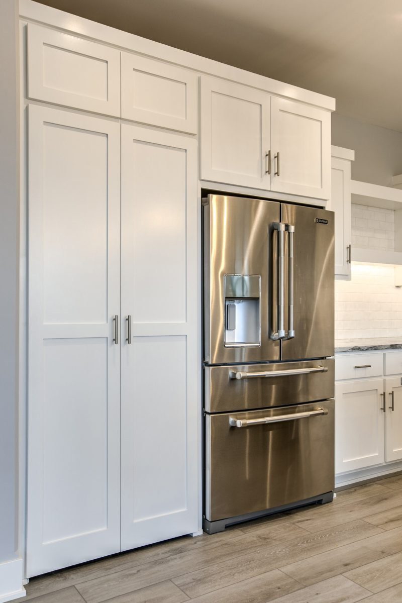 white kitchen in a home built by omaha's citadel signature homes