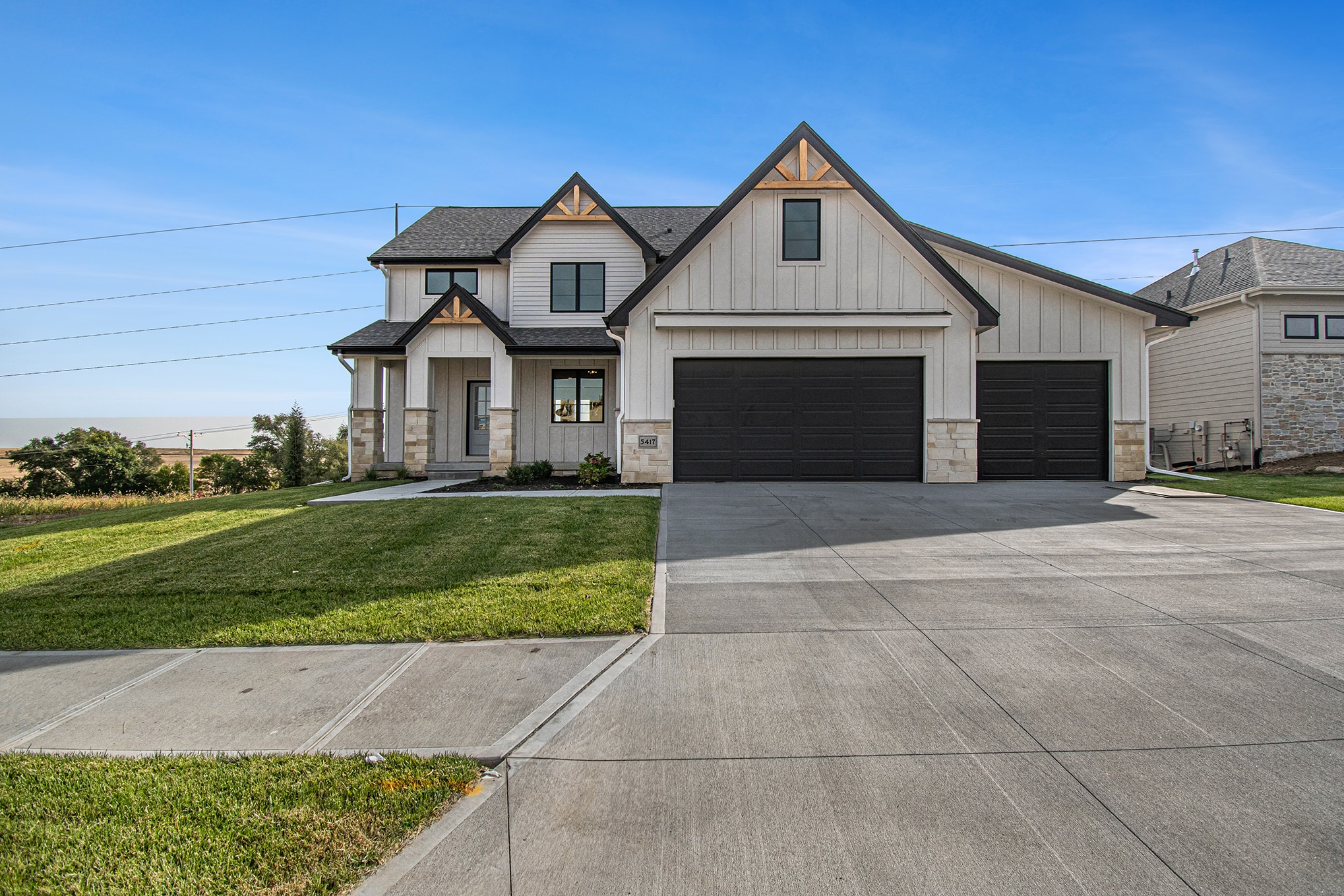 front elevation of hartman modern farmhouse